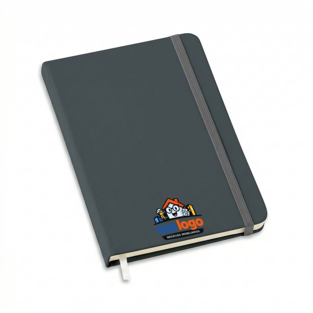 Agendas cadernos e apostilas — Caderneta — Tipo moleskine — Abertura horizontal — Miolo padrão com pauta com porta caneta — 9x14cm — Capa cinza